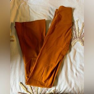 Orange Lululemon Flare Leggings